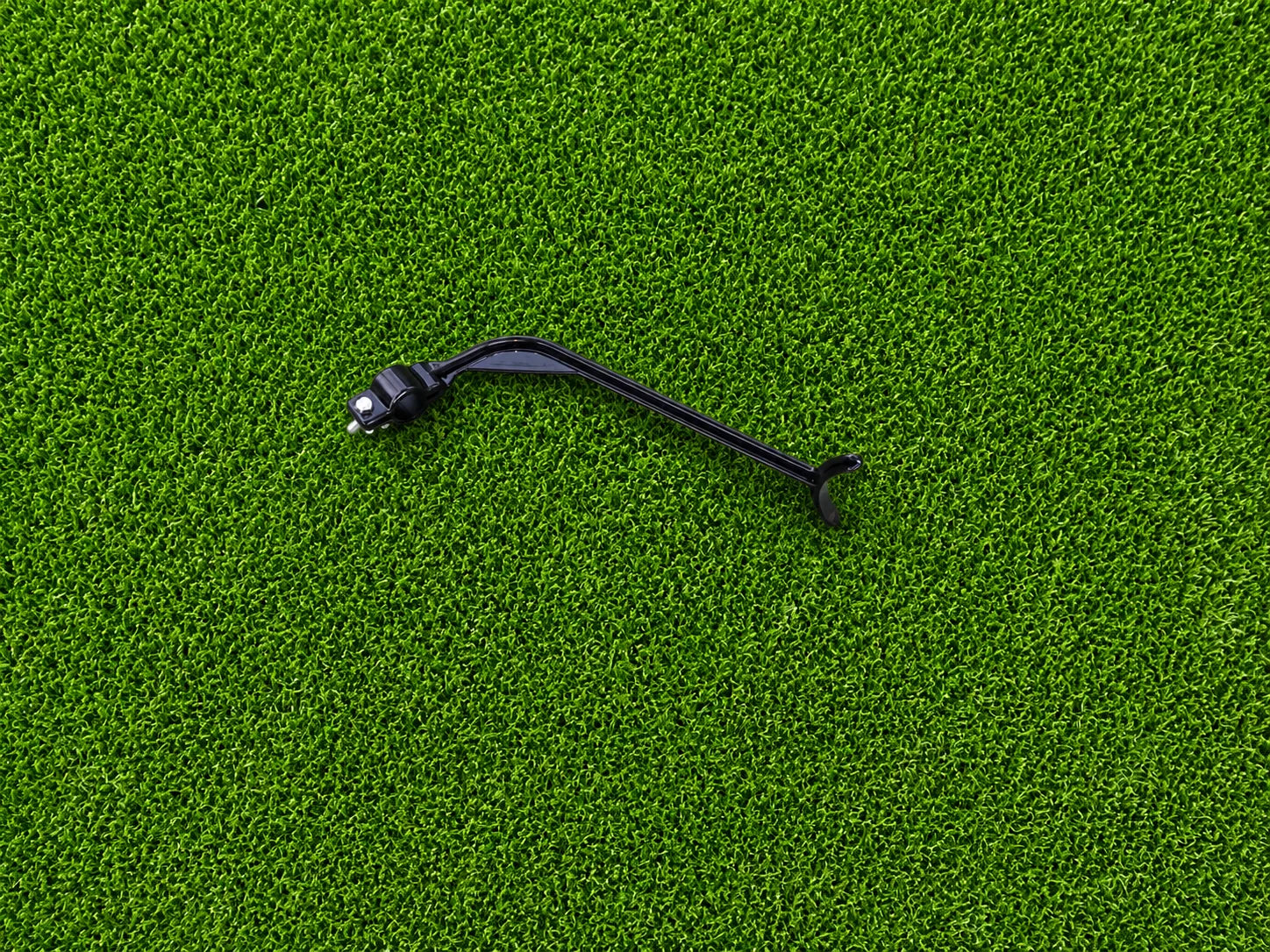 Black Swivot hinge attachment on artificial turf